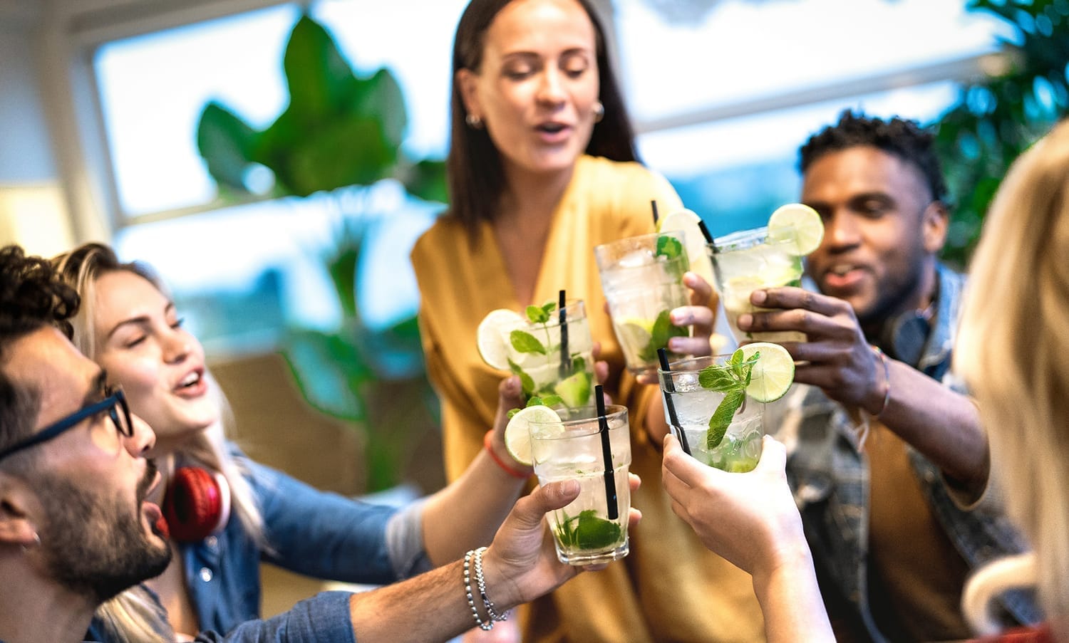 Friends toasting together in bar – Two Bears Gin brand marketing