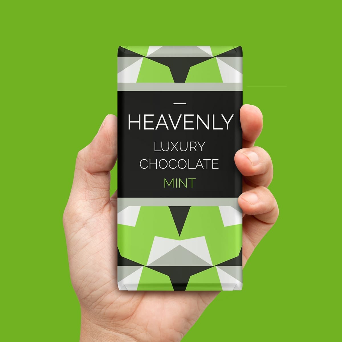 Heavenly Luxury Mint Chocolate held by hand – premium confectionery branding
