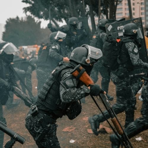 Soldiers Running with Rifles
