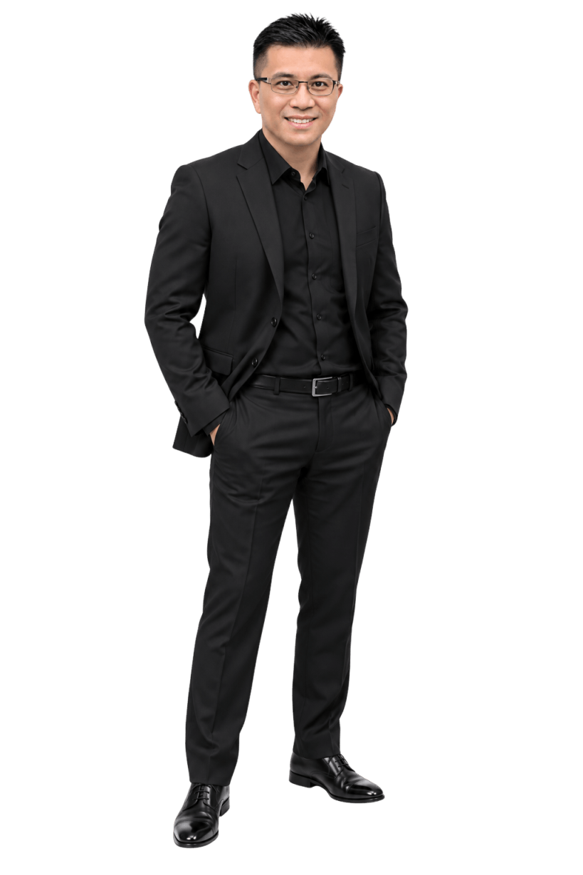 Sen Ze standing in a dark suit