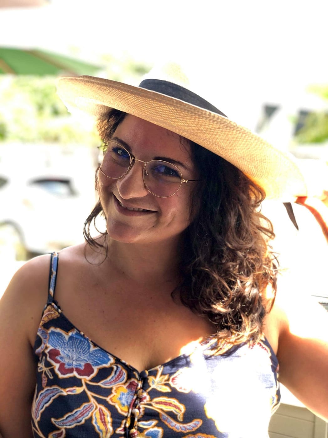 Profile with tropical island hat Maria Phieros, Creative Director of AM Studio Créatif, award-winning brand designer