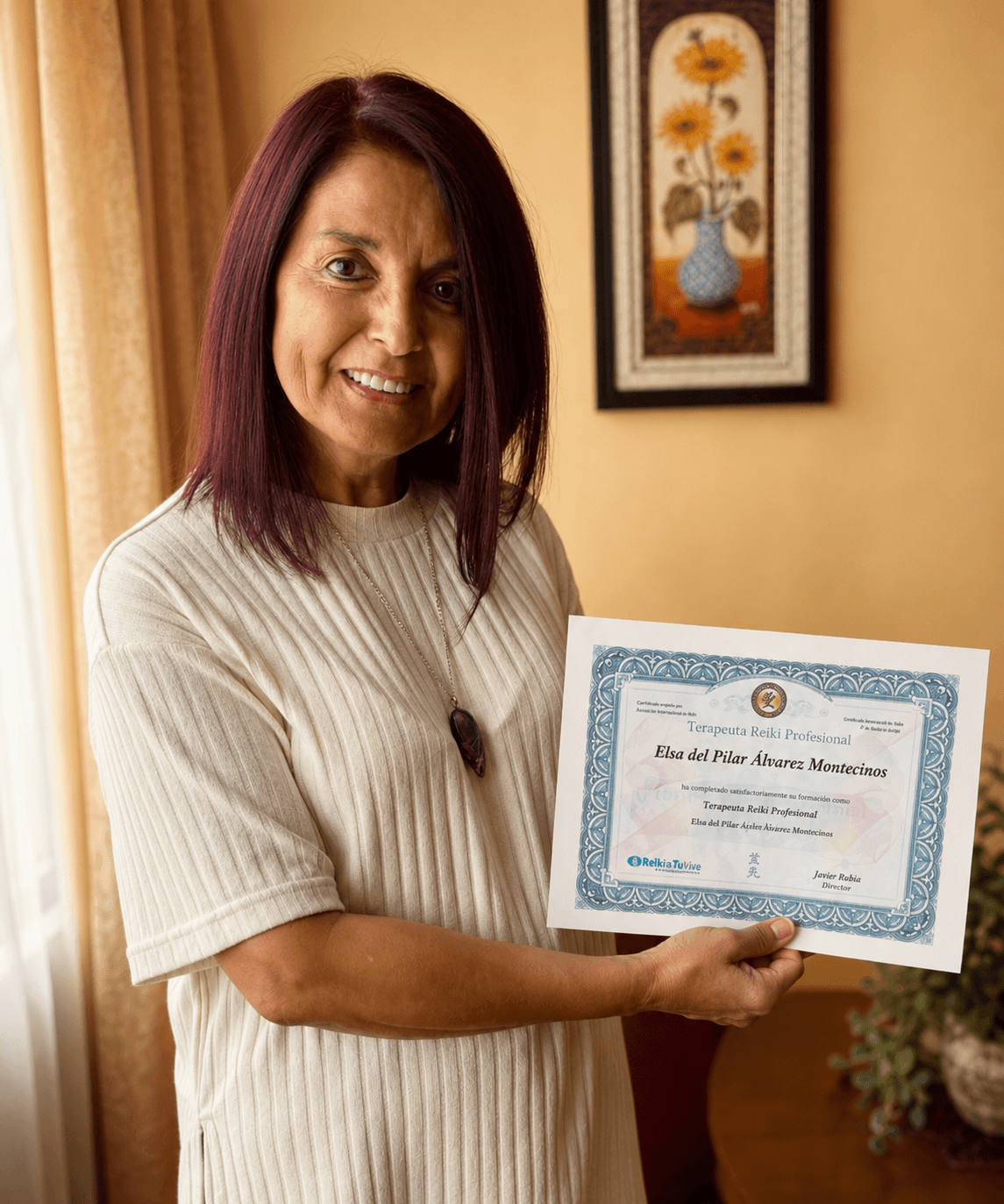 Alumna de JavierMa con diplomas de Reiki