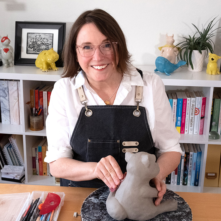 Cheryl B Hutchinson working on ceramic scultpture