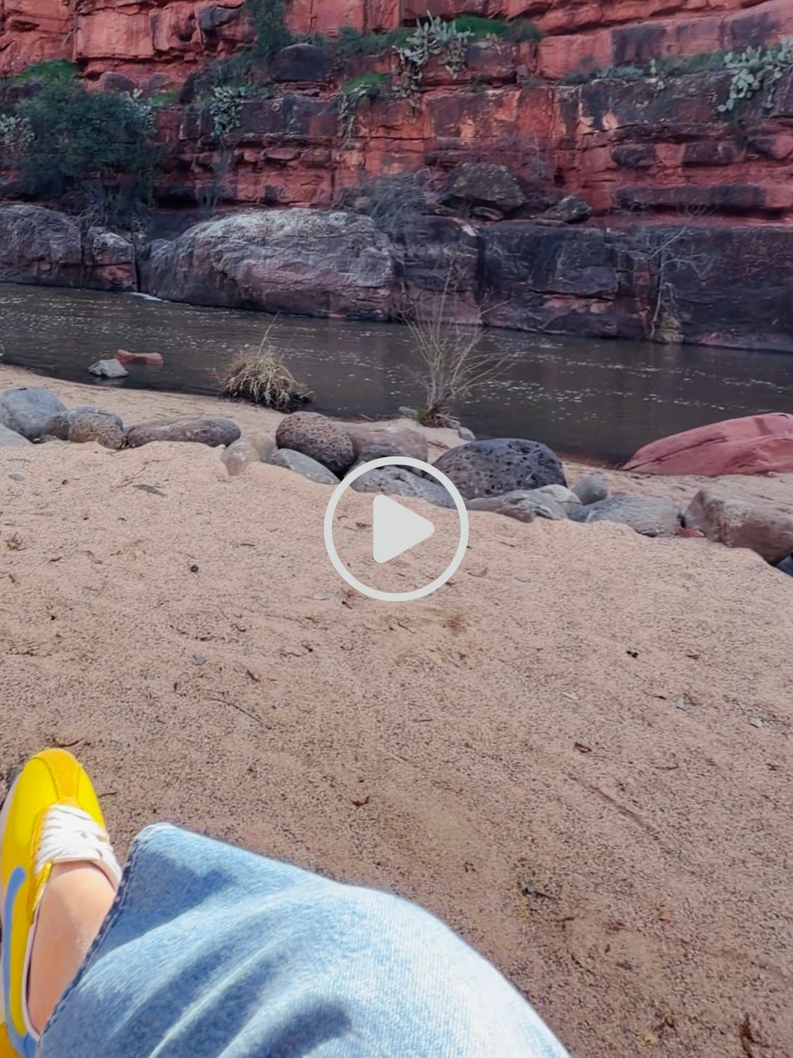 POV view relaxing by Oak Creek in Sedona capturing a core memory experience, making life an occasion.
