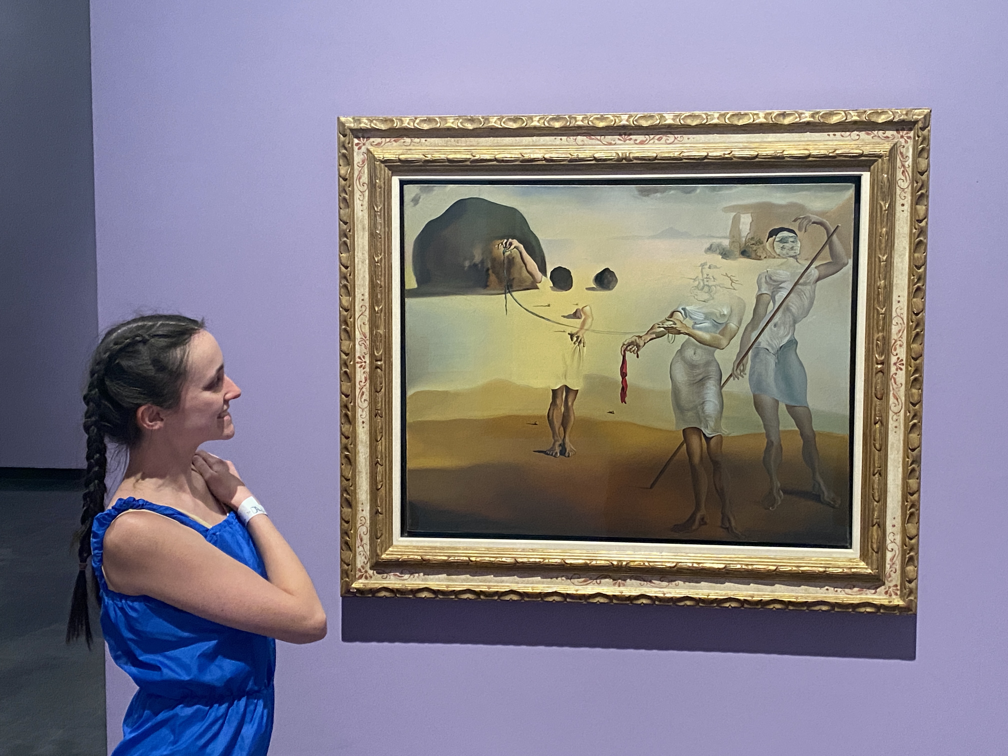 Co-performer Shianne posing with the Dalí painting that inspired our dance | The Orthodox Snake Writing Agency
