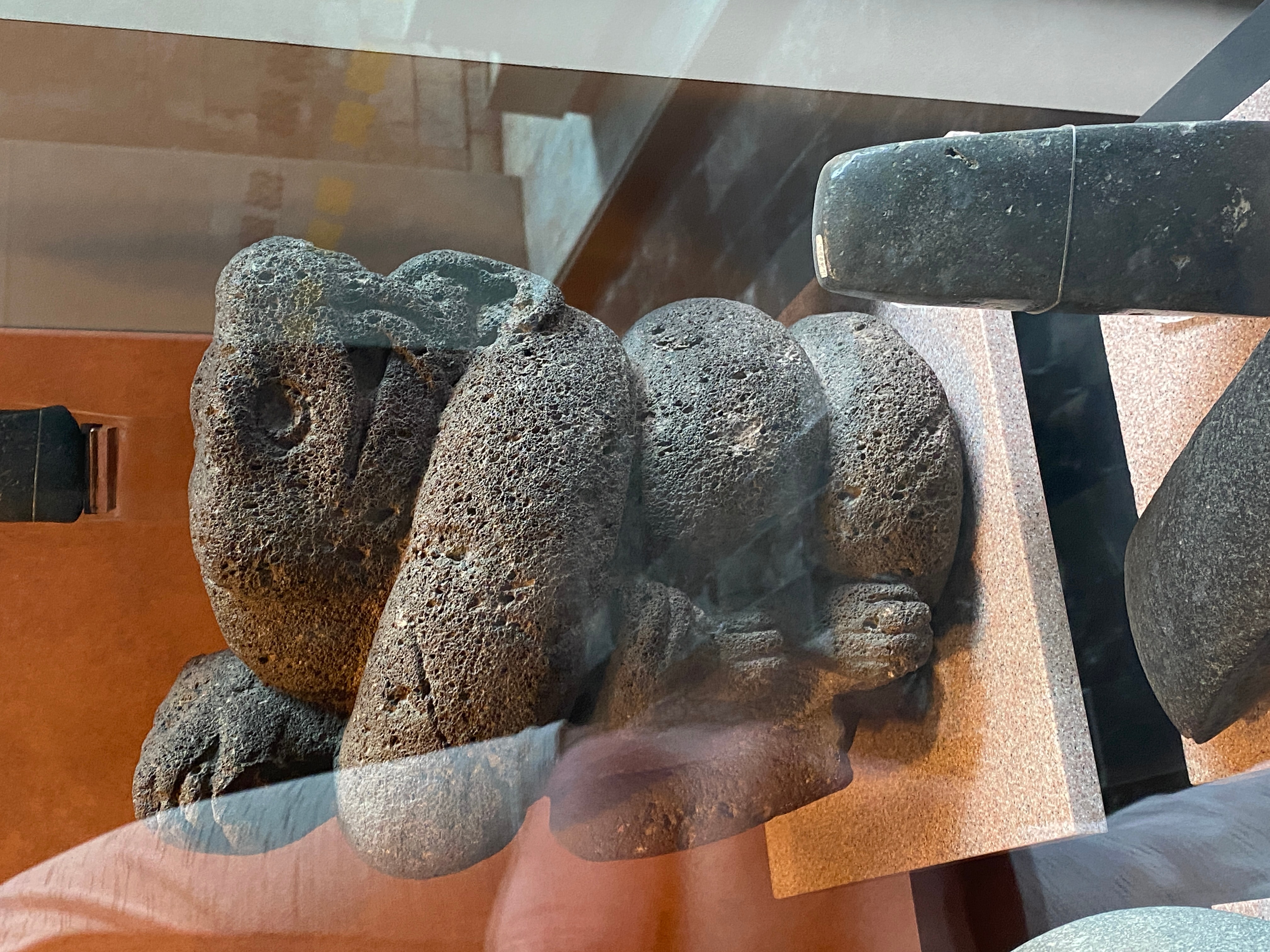 Lava rock snake art from ancient Mexico | The Orthodox Snake Writing Agency