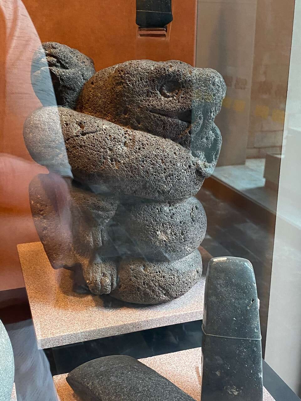 Lava rock snake art from ancient Mexico | The Orthodox Snake Writing Agency