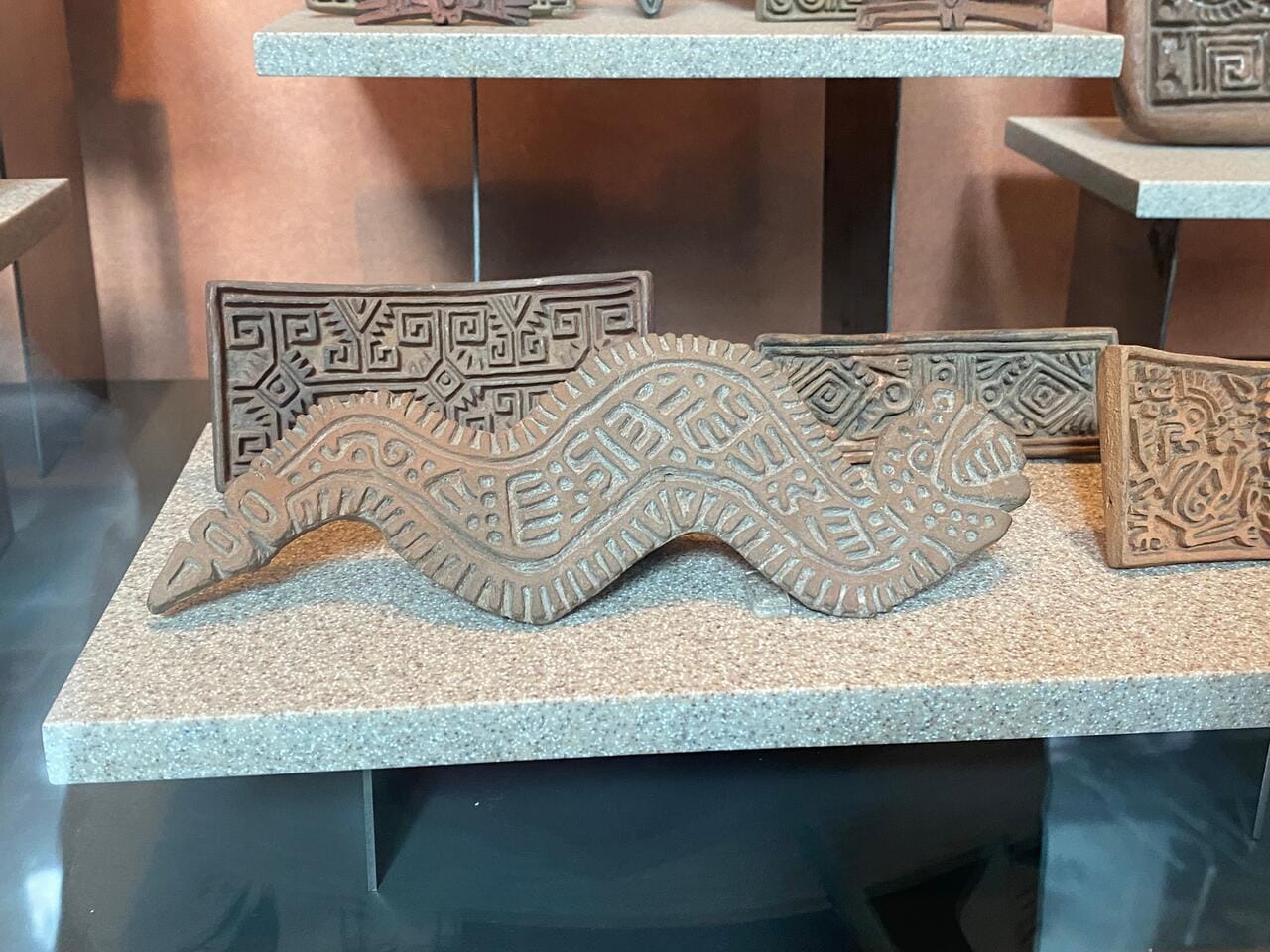 Ancient snake plaque they'd hang above their doors in ancient times | The Orthodox Snake Writing Agency