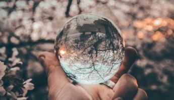 Intuitive compass session - a warmly lit compass by a window