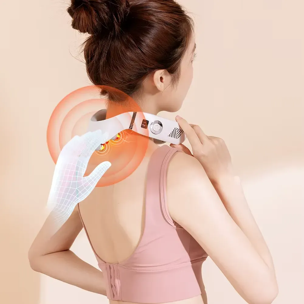 Compact and wearable white U-shaped wireless Neck massager utilizing electrical pulse technology and gentle heat for computer neck pain relief at a desk.