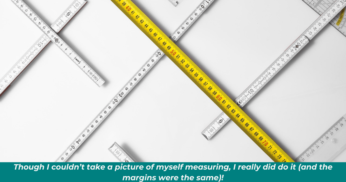 Image of multiple rulers over a blank page