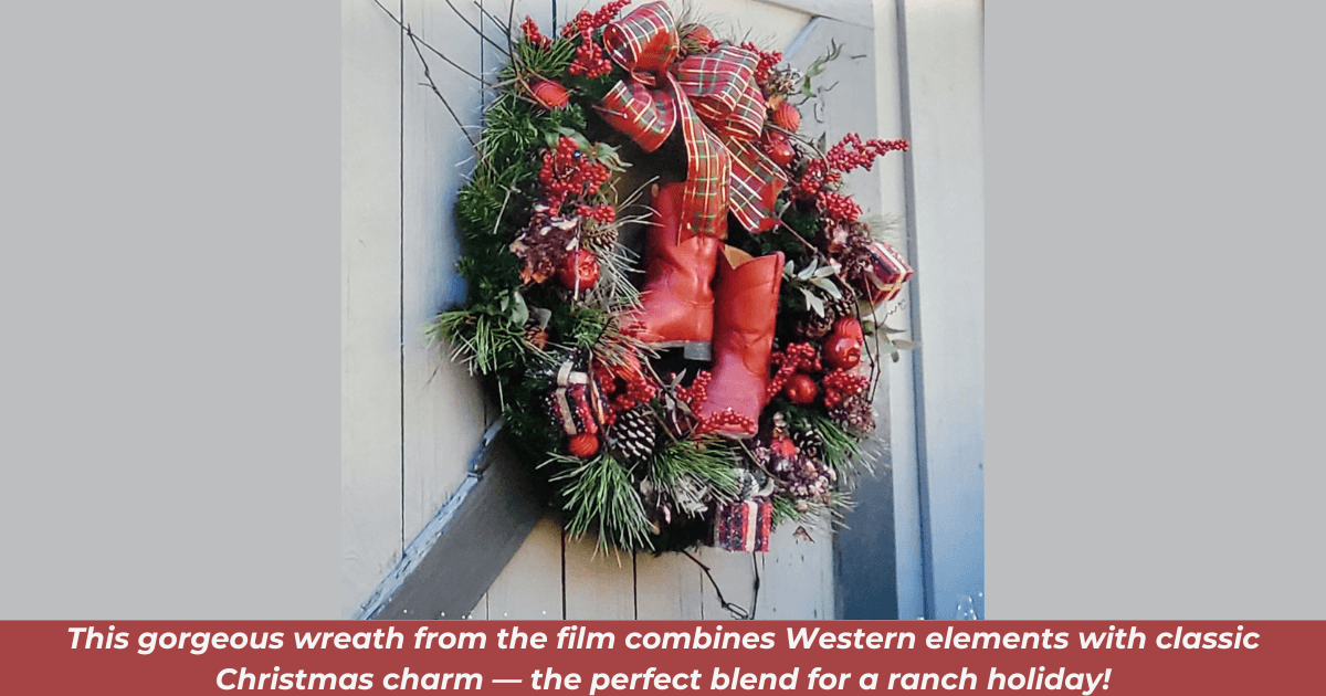 An photograph of a Western Christmas wreath. It's a pine wreath with red holly and snow-covered pinecones and presents. A big red-and-green plaid bow is placed at the top of the wreath. In the center of the wreath is a pair of red cowgirl boots. So cute! The caption reads, "This gorgeous wreath from the film combines Western elements with classic Christmas charm — the perfect blend for a ranch holiday!"