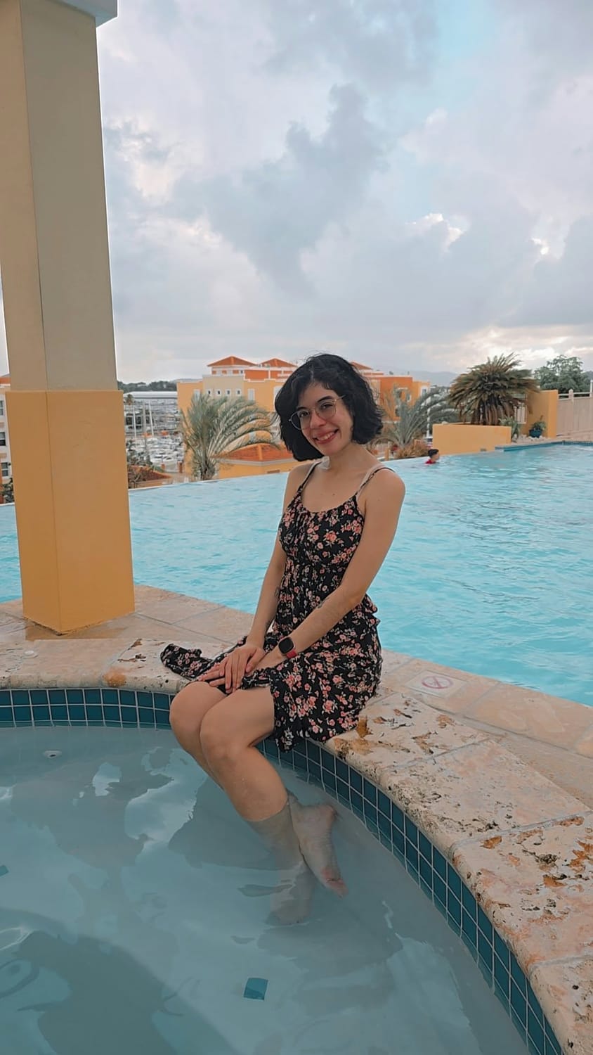 Stephanie “Pempi” Ortiz relaxing by the jacuzzi