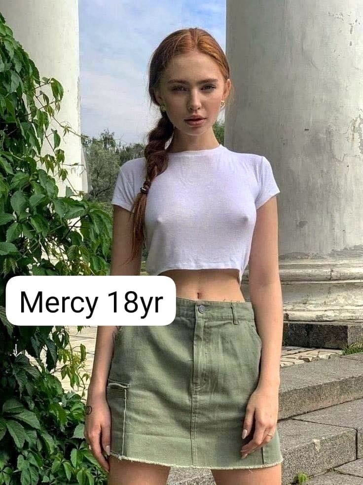 beautiful hot girl in white short top nipples protruding greenish skirt navel visible