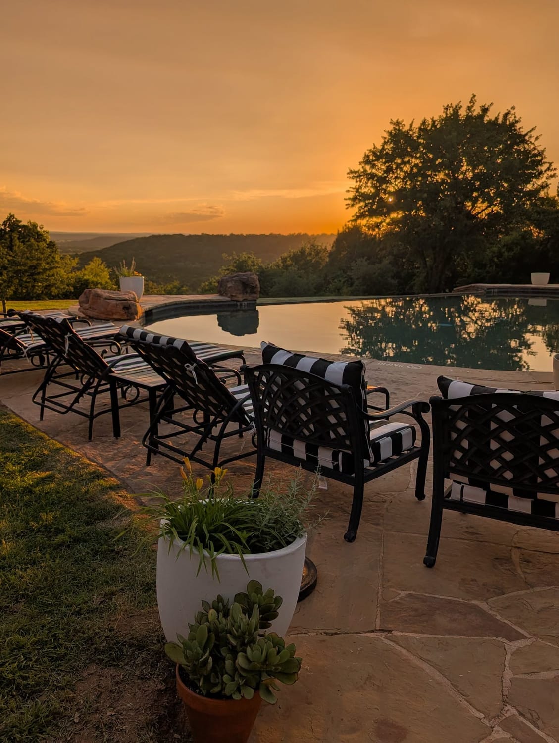 Pool overlooking the hill country at sunset