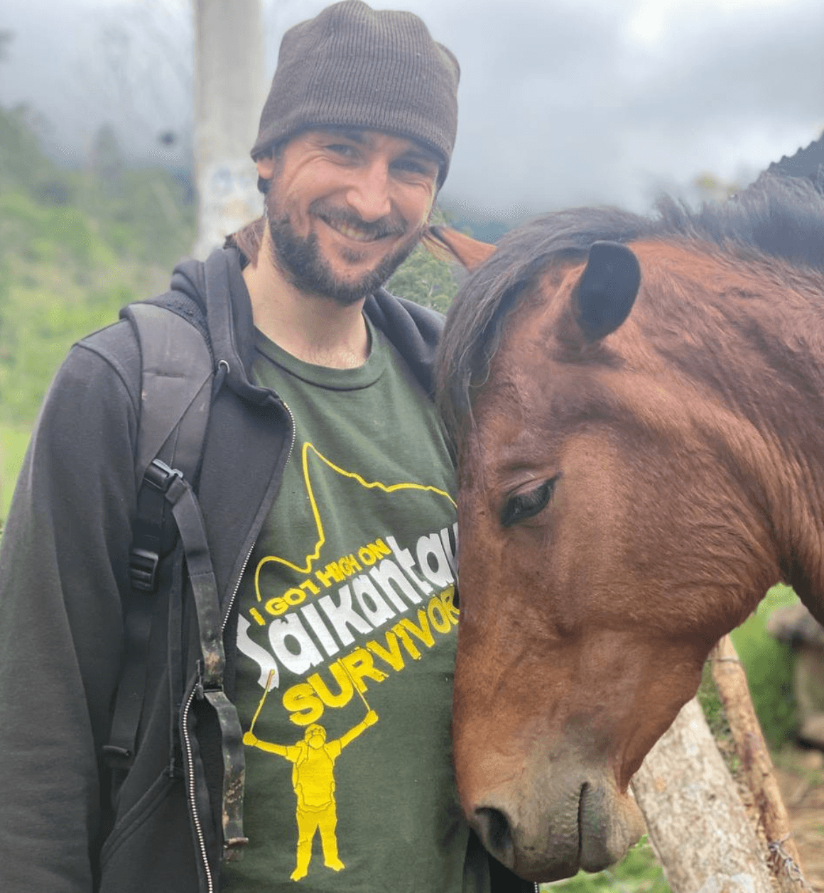 Callum with a horse in Costa Rica