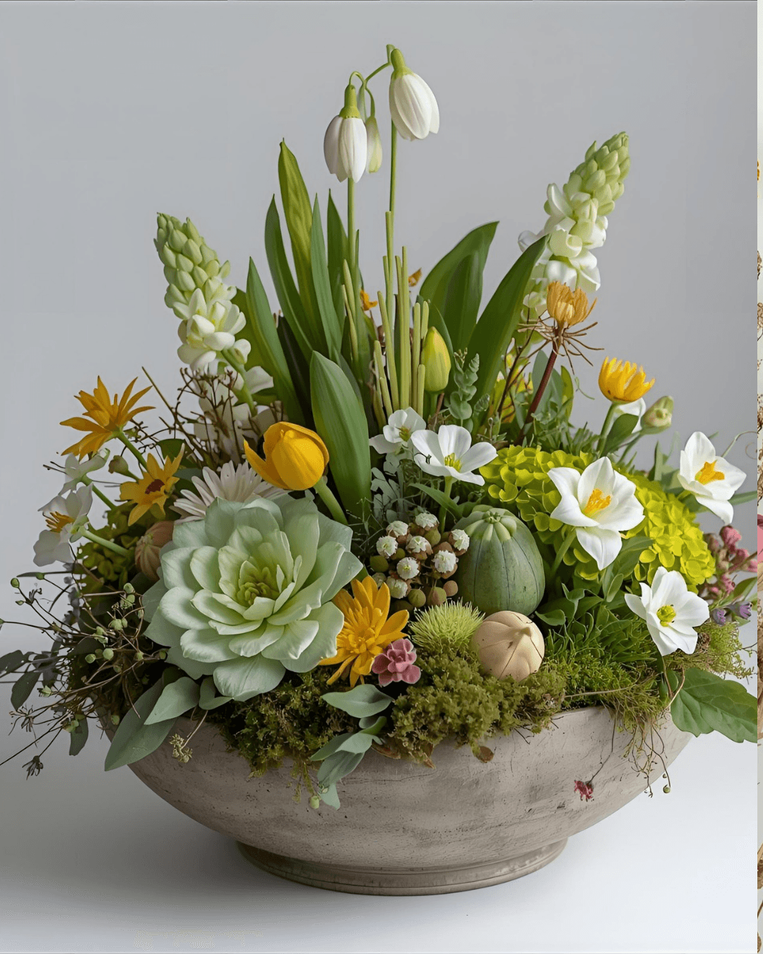 Summer floral arrangement with candle