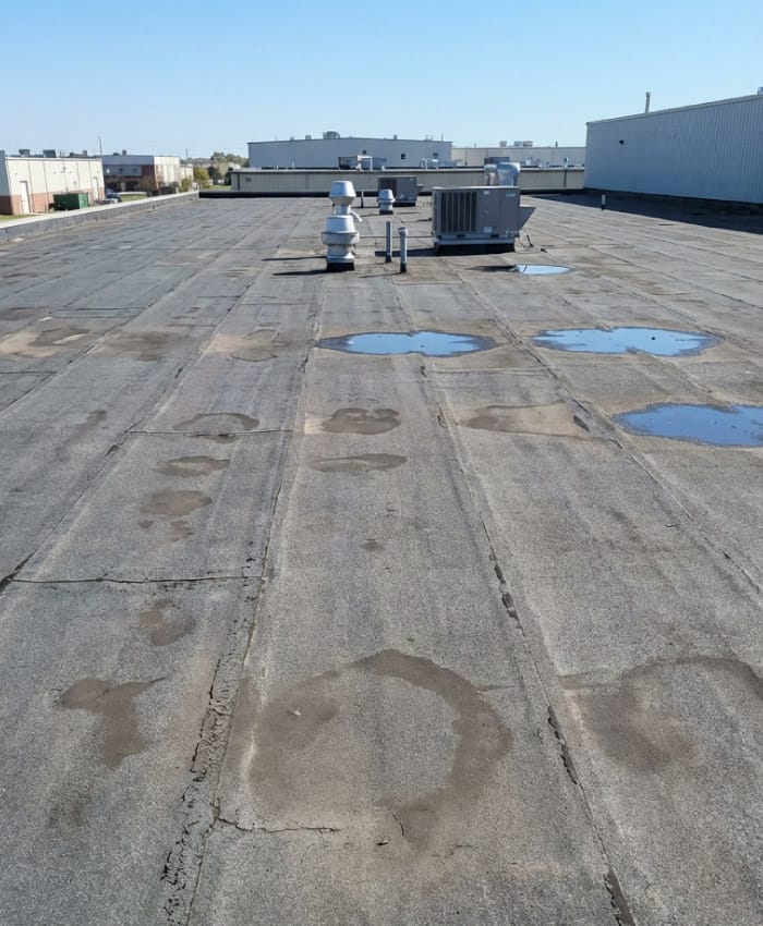 impermeabilizzazione copertura edificio con infiltrazioni