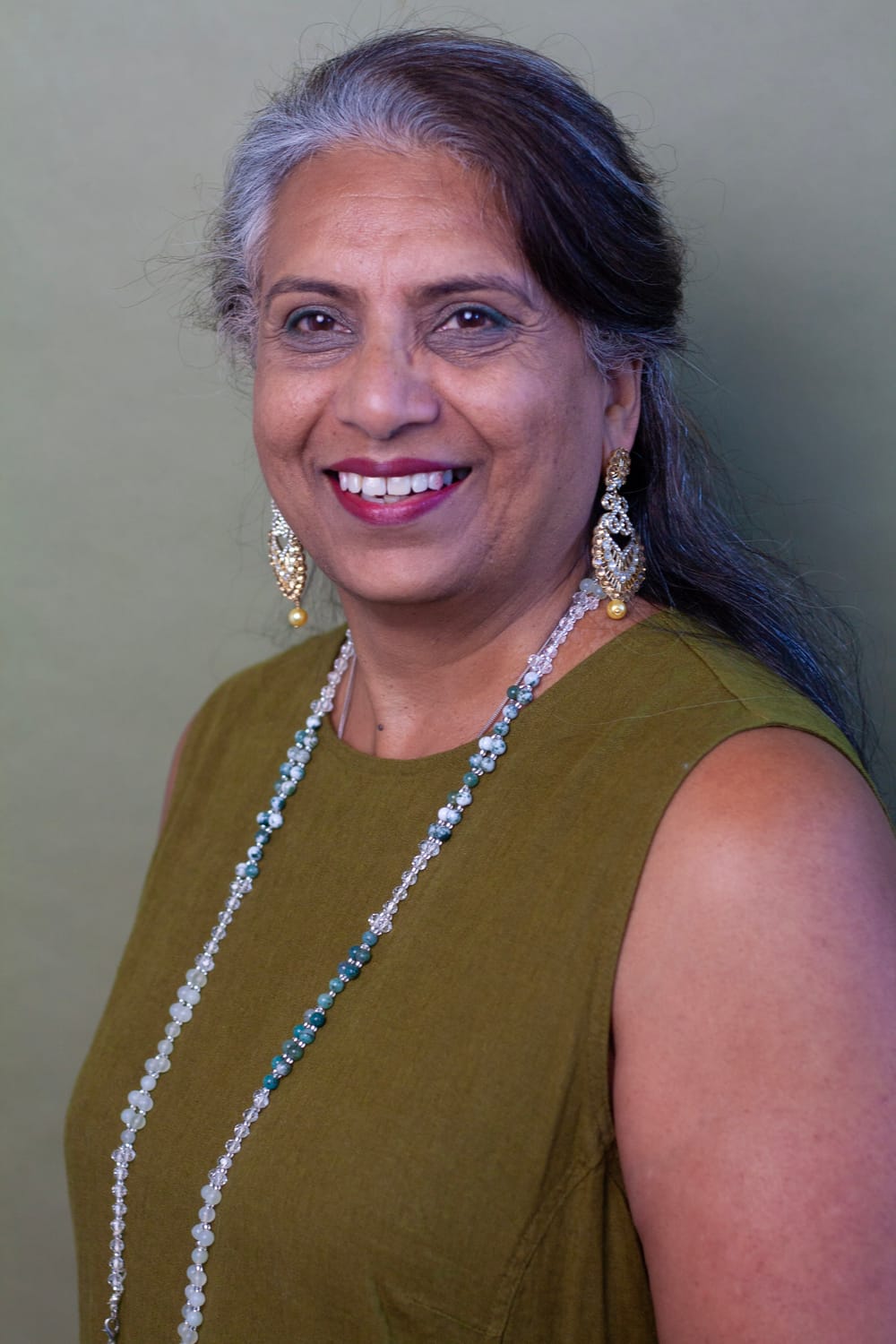 Harjit smiling warmly