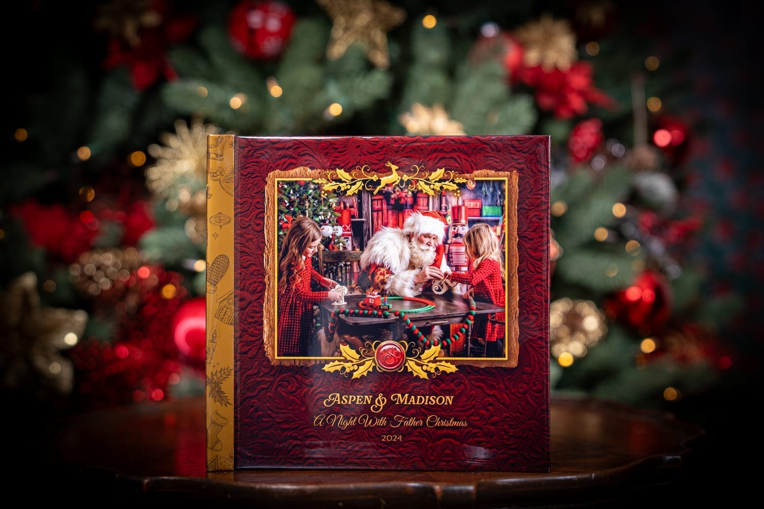 Customized Santa Story Book album with santa building toys with two young sisters in his workshop