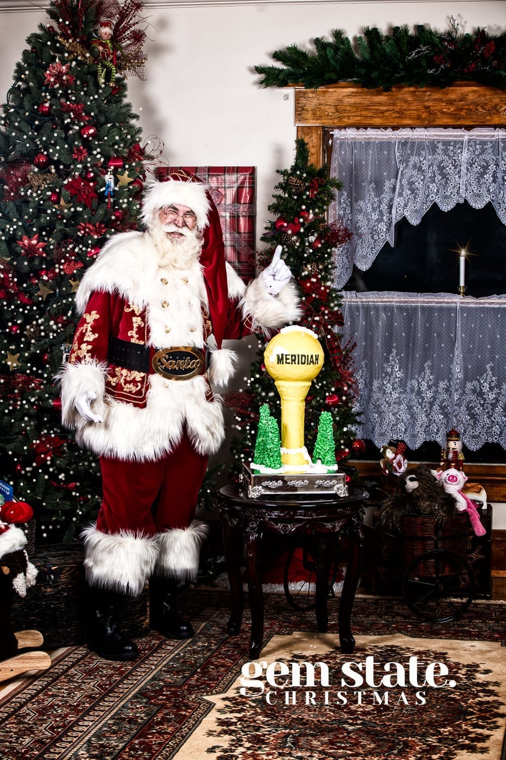 Postcard with santa sprinkling magic on a sweet little girl in his parlor in downtown meridian idaho 