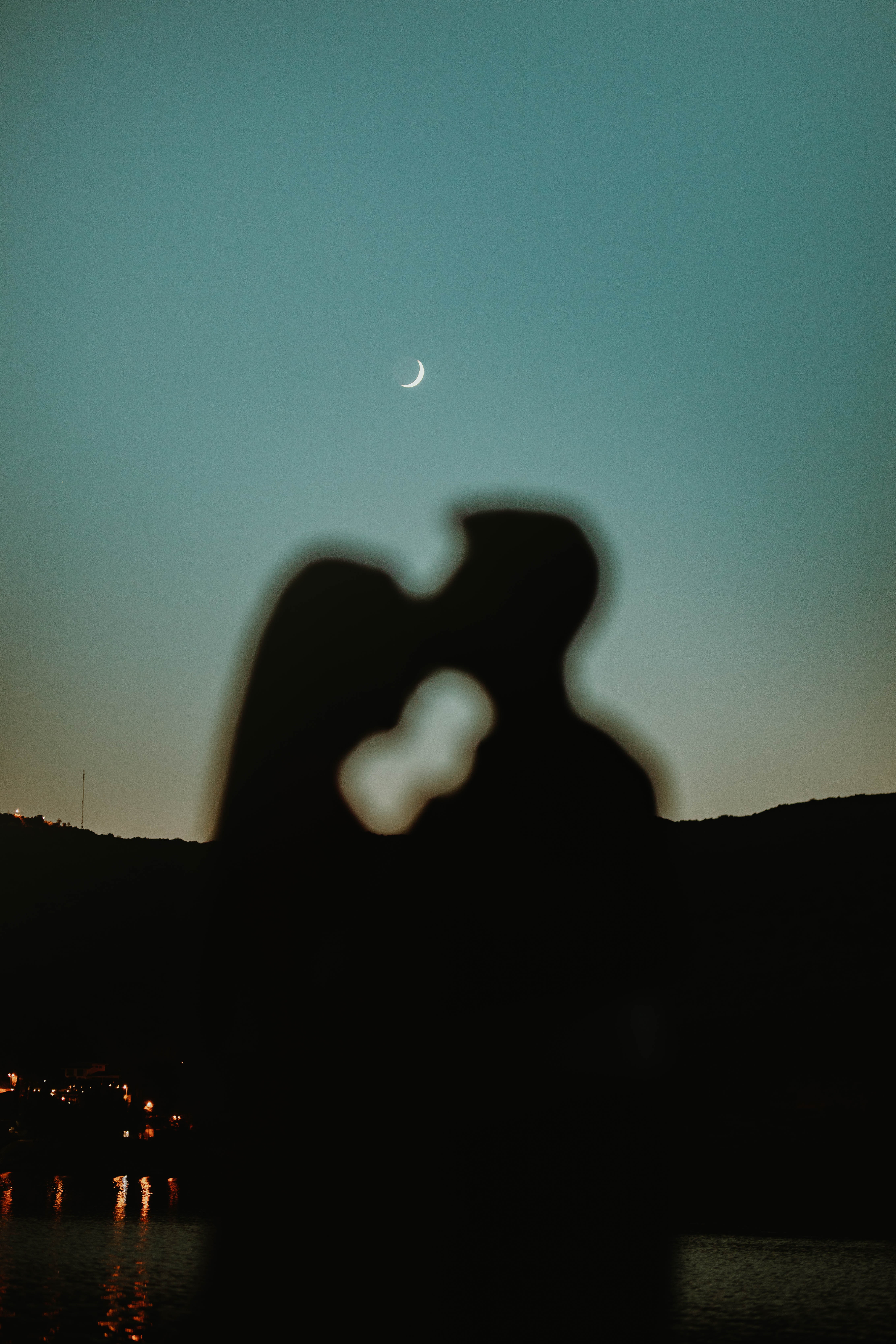 a couple giving each other a kiss