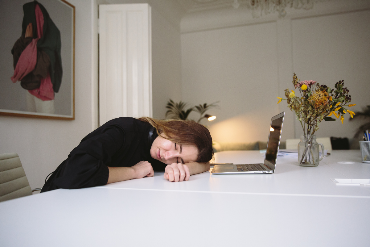 woman sleeping on the desk