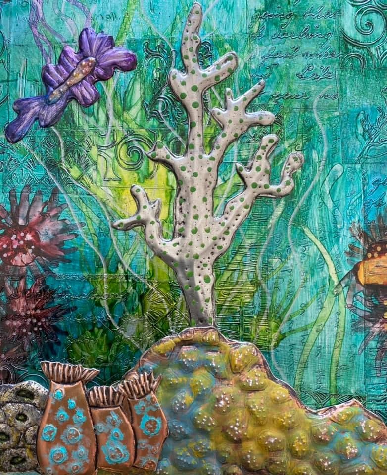 Embossed metal ocean art with alcohol ink by Ninette Kruger
