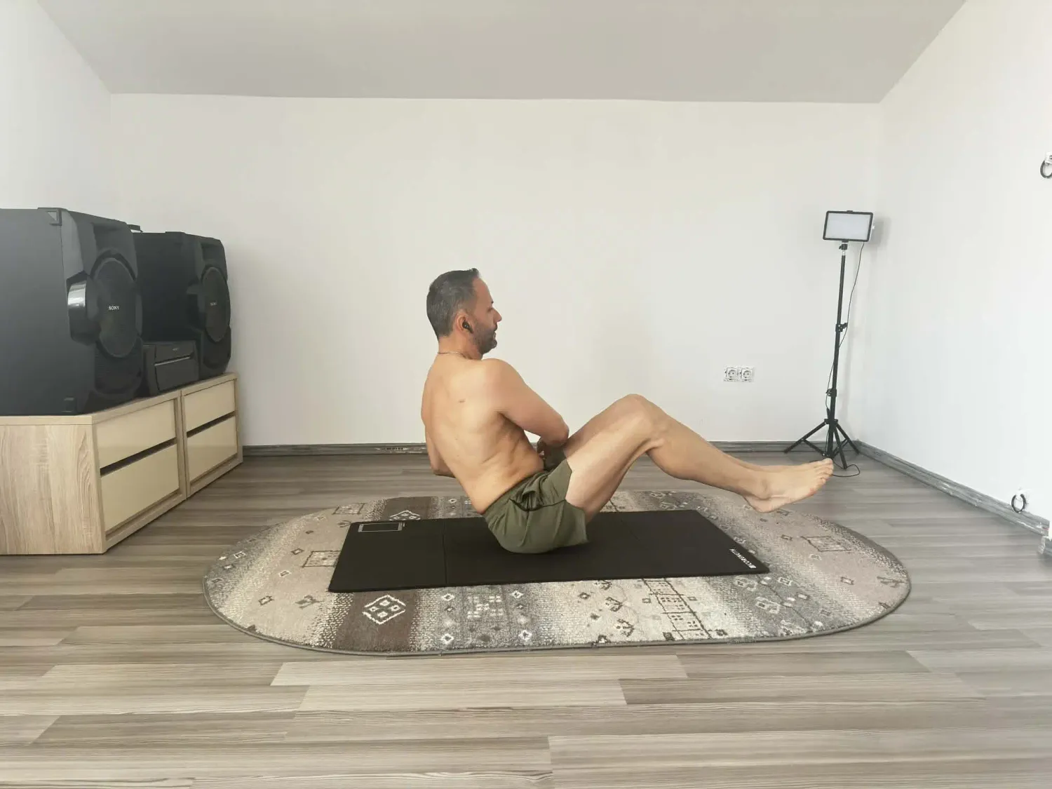 rasuciri rusesti pentru abdomen sau russian twists pentru musculatura abdominala