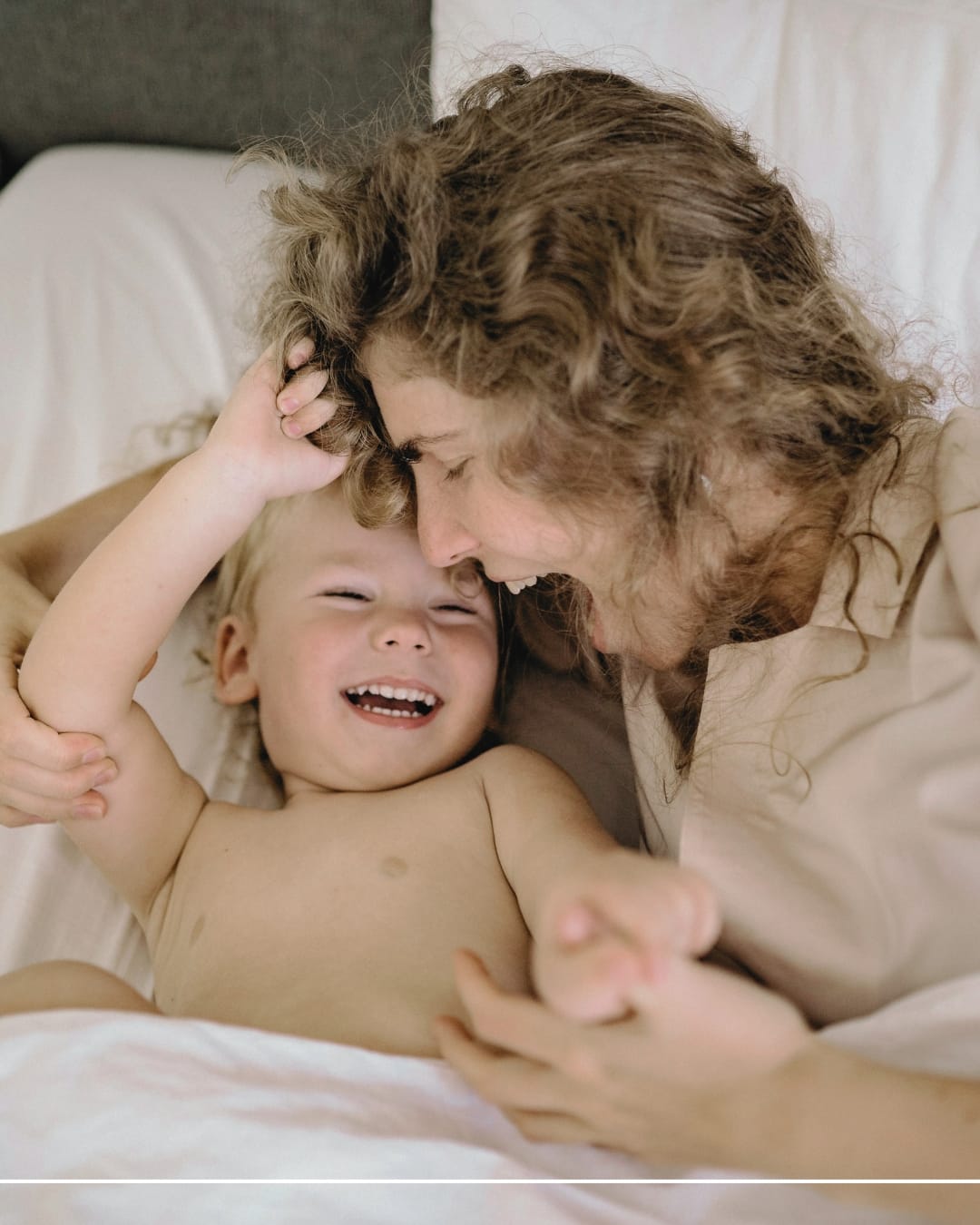 Toddler sleeping in bed