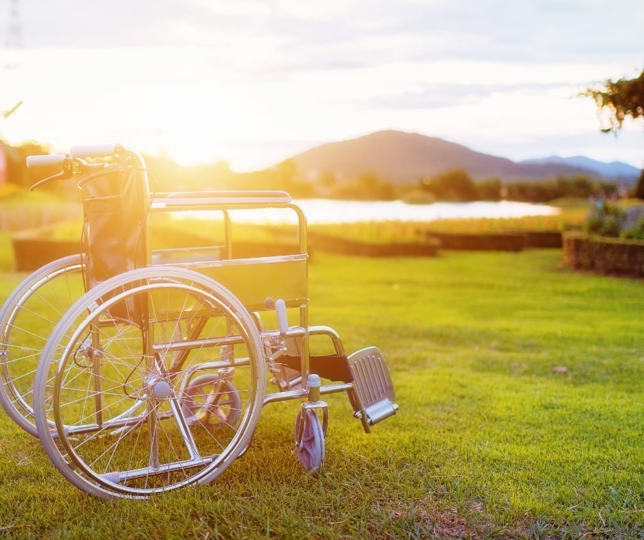 an image of empty wheelchair in the nature