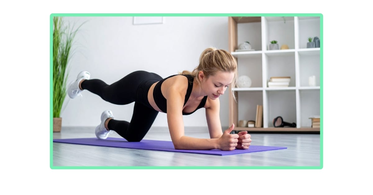 a woman exercising her body on the joga mat