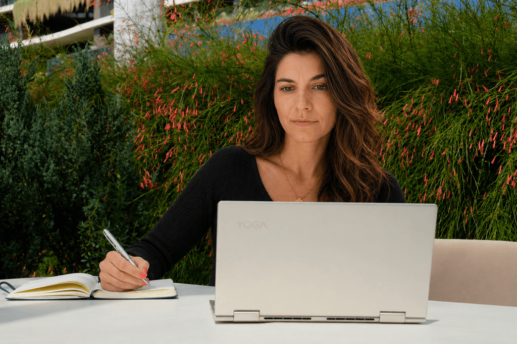 Diana Grobelny working at her laptop