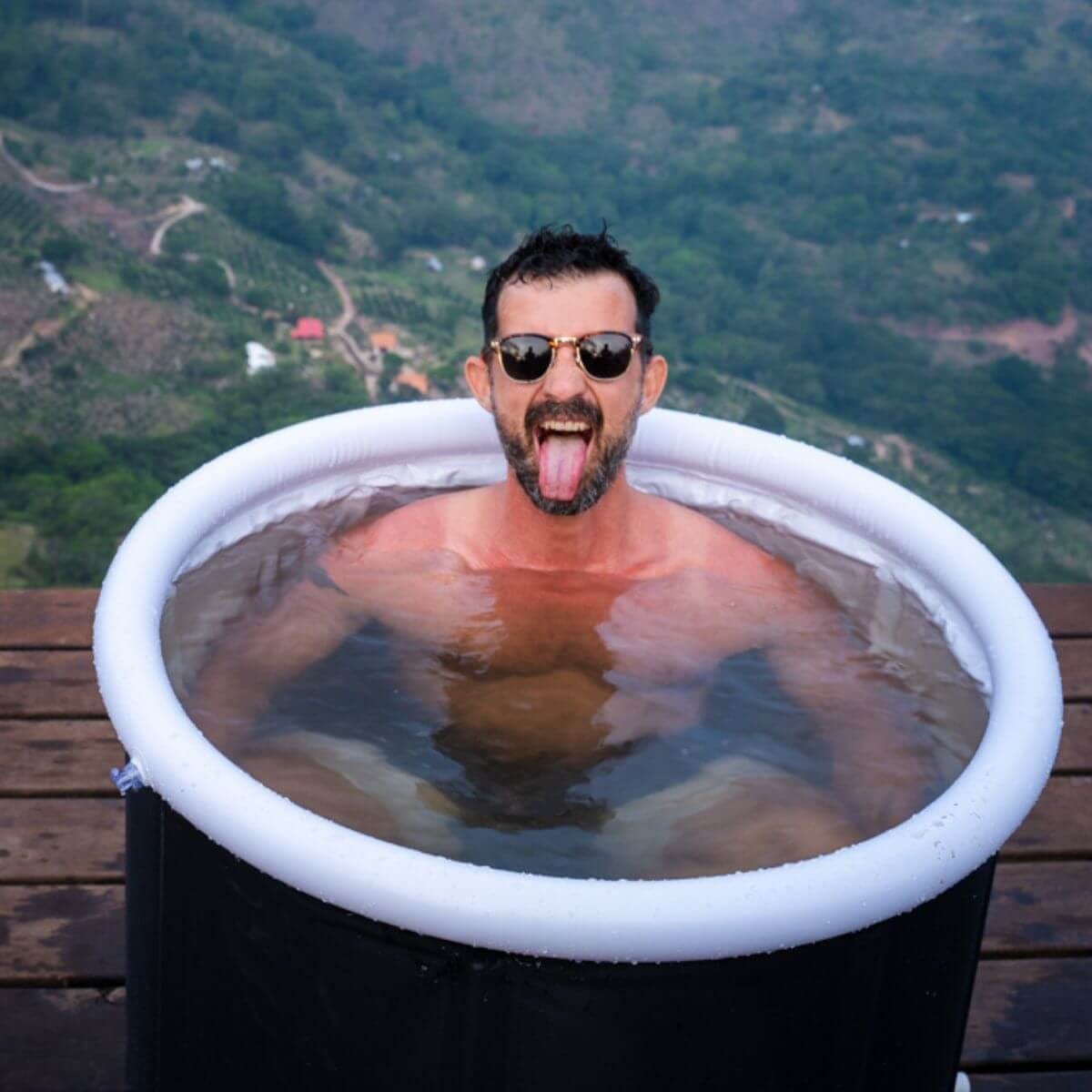 Man in an ice bath, enduring pain