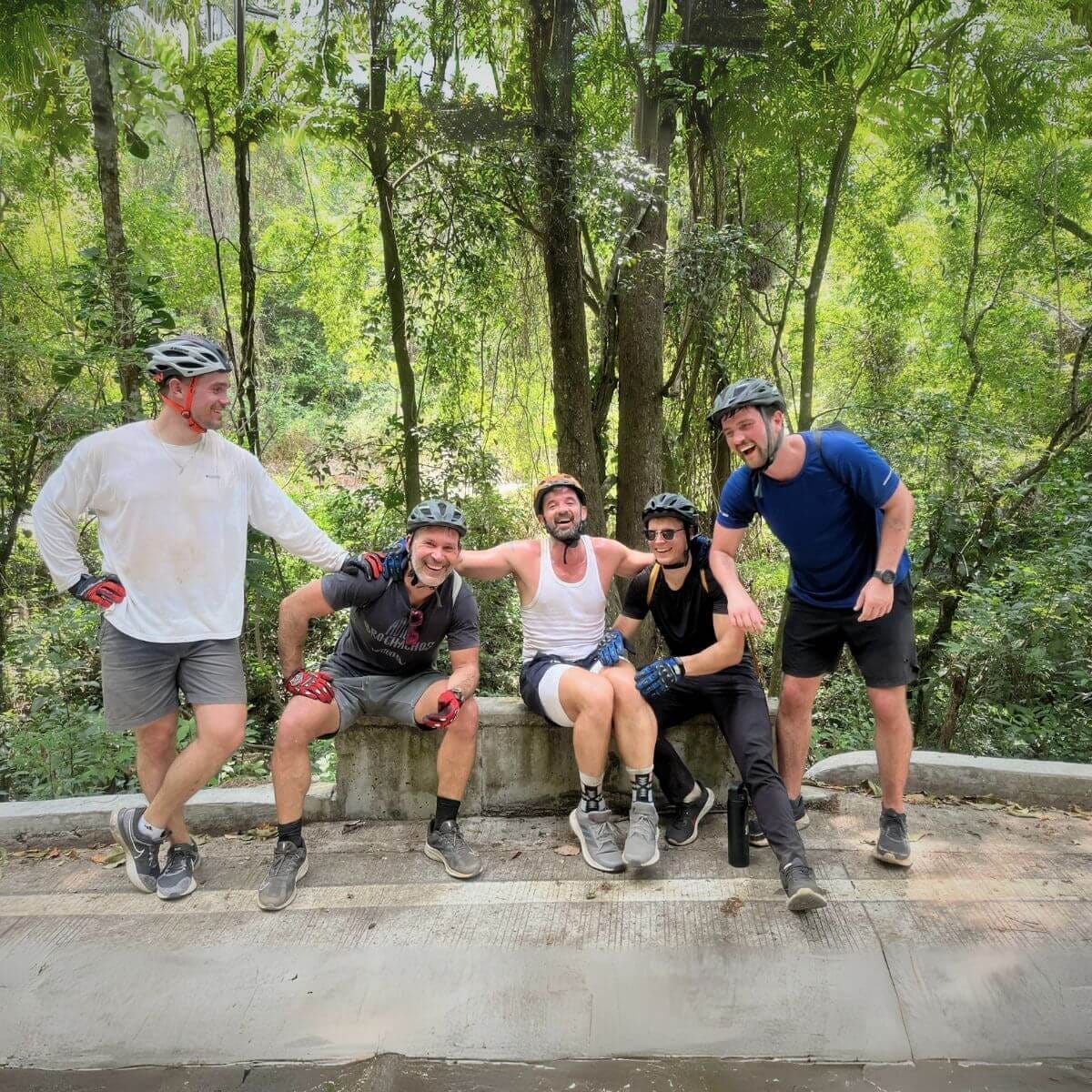 Group of guys cycling and having fun