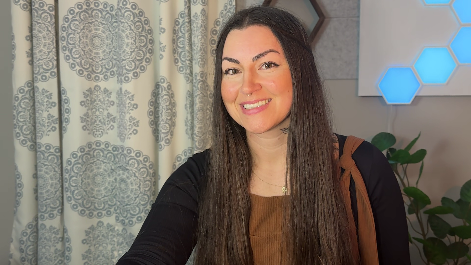 Kendryah, a successful master resell rights seller, standing confidently with a backdrop of digital screens displaying graphs of upward sales trends and various digital products. She is depicted holding a laptop, symbolizing her digital expertise, with a six-figure income highlighted on the screen, reflecting her financial success in the industry. The image conveys Kendryah's mastery in leveraging resell rights for financial freedom and her role as a leading figure in the digital marketing space.