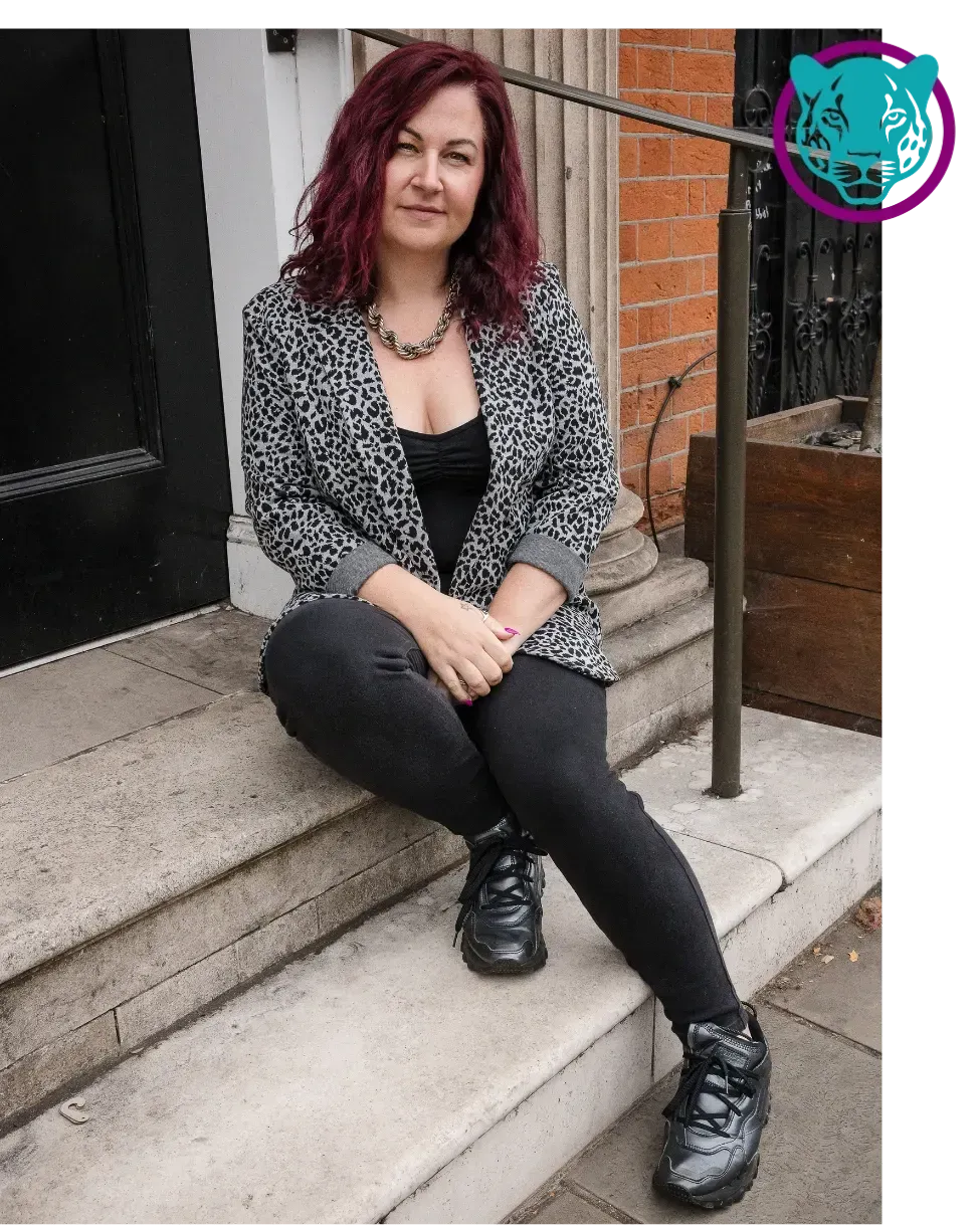 Leah Gregory High Ticket Sales Strategist Sat on Steps outside door