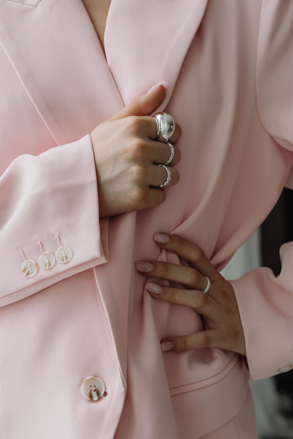 Business woman in a pink suit