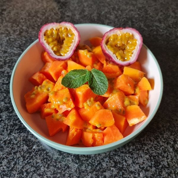 Papaya and passion fruit bowl with mint, a Raw Reset meal example