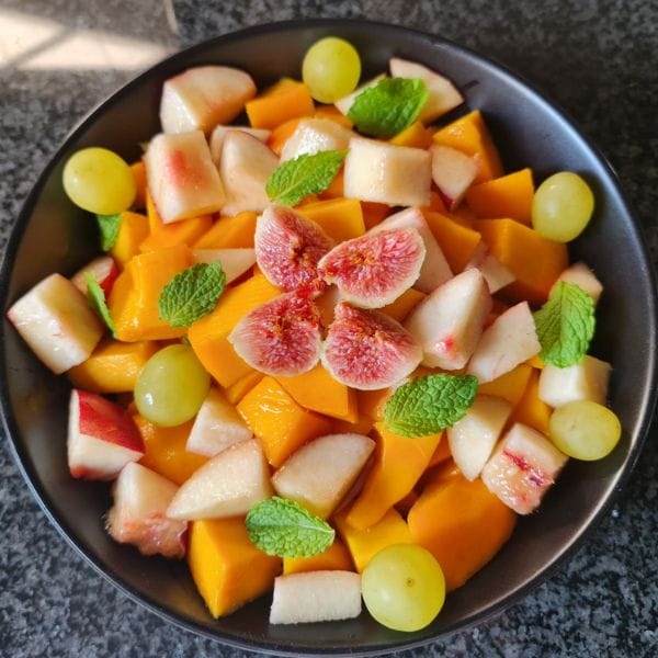 Fresh peach, fig and grape fruit salad supporting natural healing