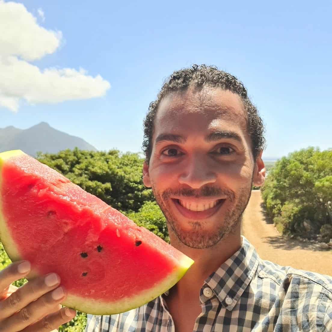 Ceferino Cenizo eating watermelon fruit