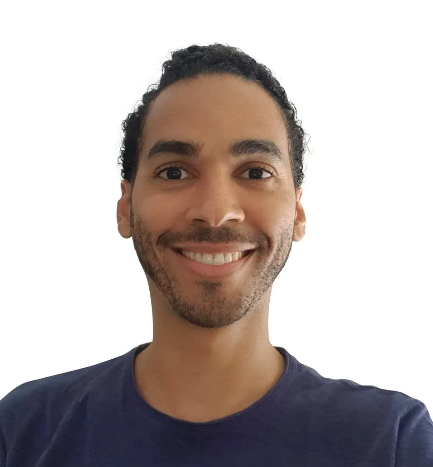 Ceferino Cenizo, Holistic Health & Detox Coach, smiling in a navy t-shirt.