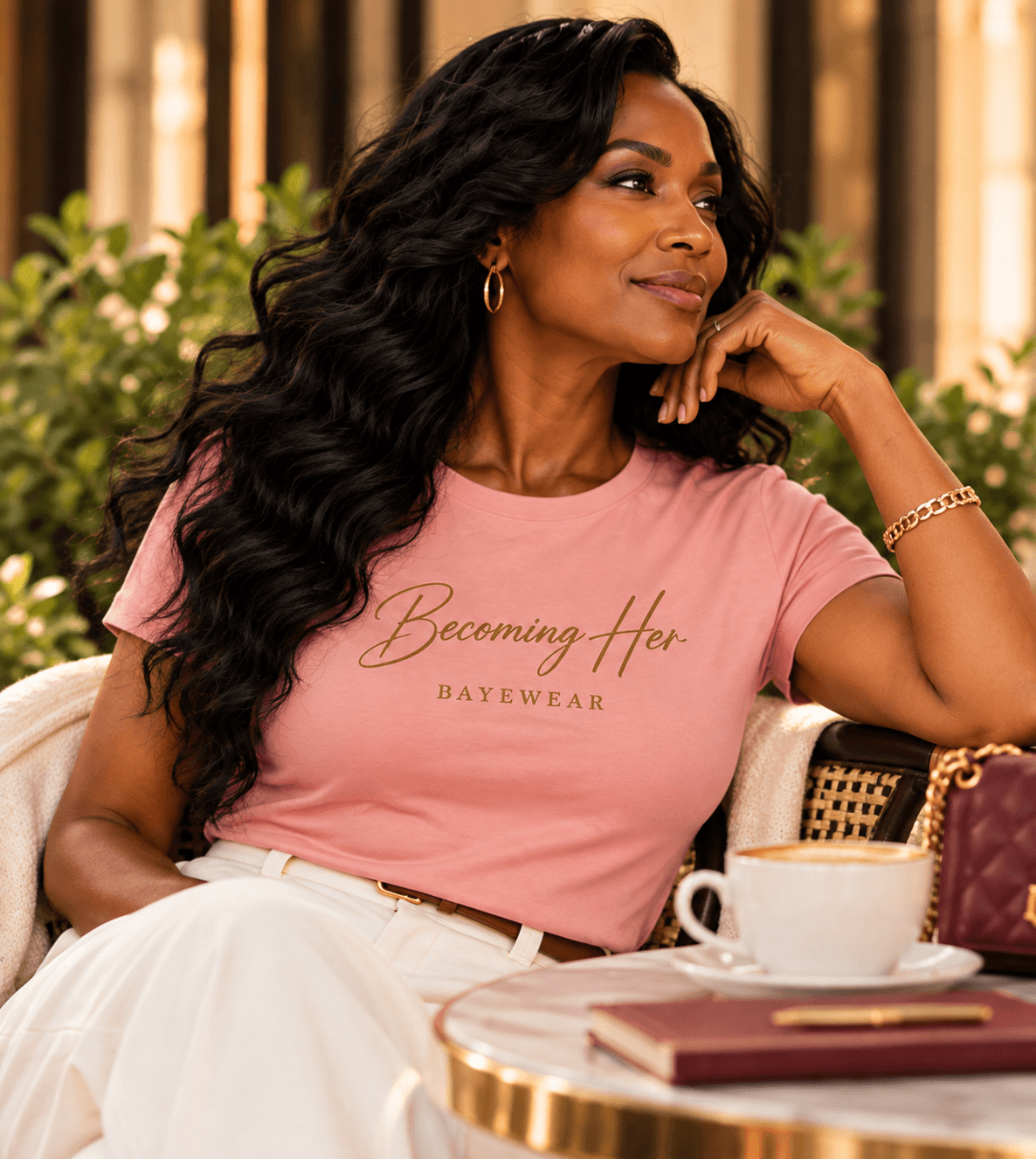 Woman wearing pink Becoming Her BayeWear tee