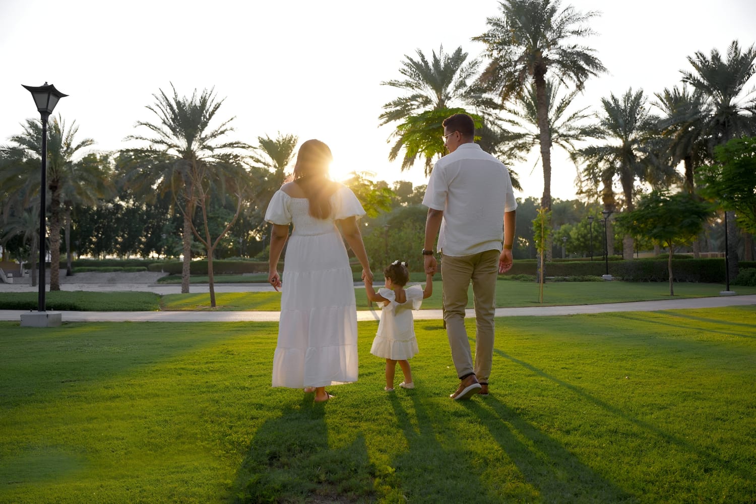 Family walk at sunset