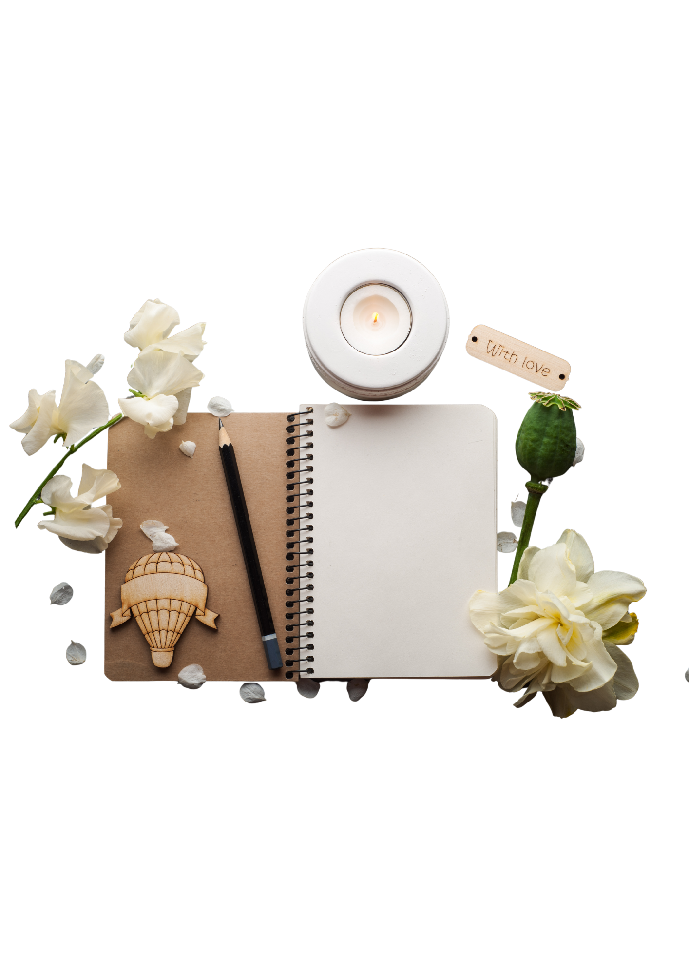 Image of a journal, pencil, candle and flowers