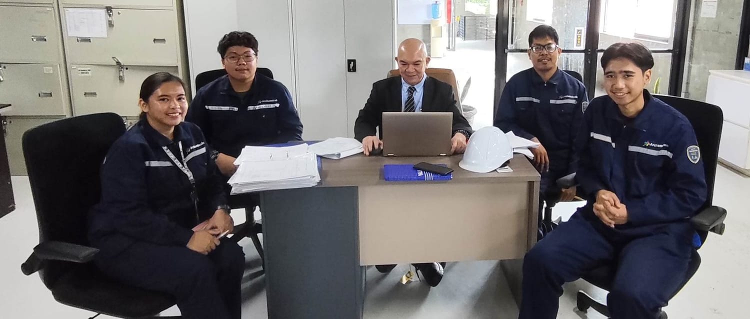 Roy Bahala reviewing documentation during an ISO 9001 recertification audit