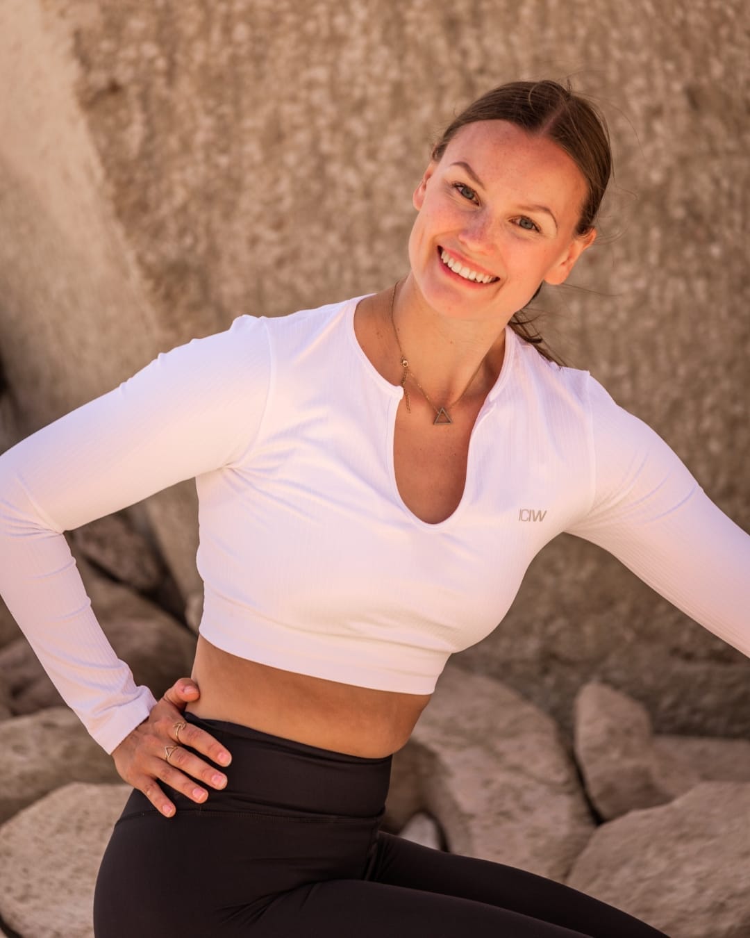 Warm portrait of yoga photographer Sini Hietaharju, RYT-500 yoga teacher and wellness storyteller