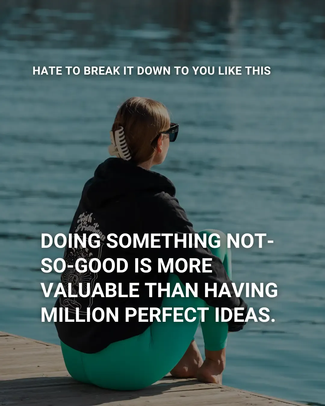 action-over-perfectionism-girl-sitting-by-the-water-contemplating