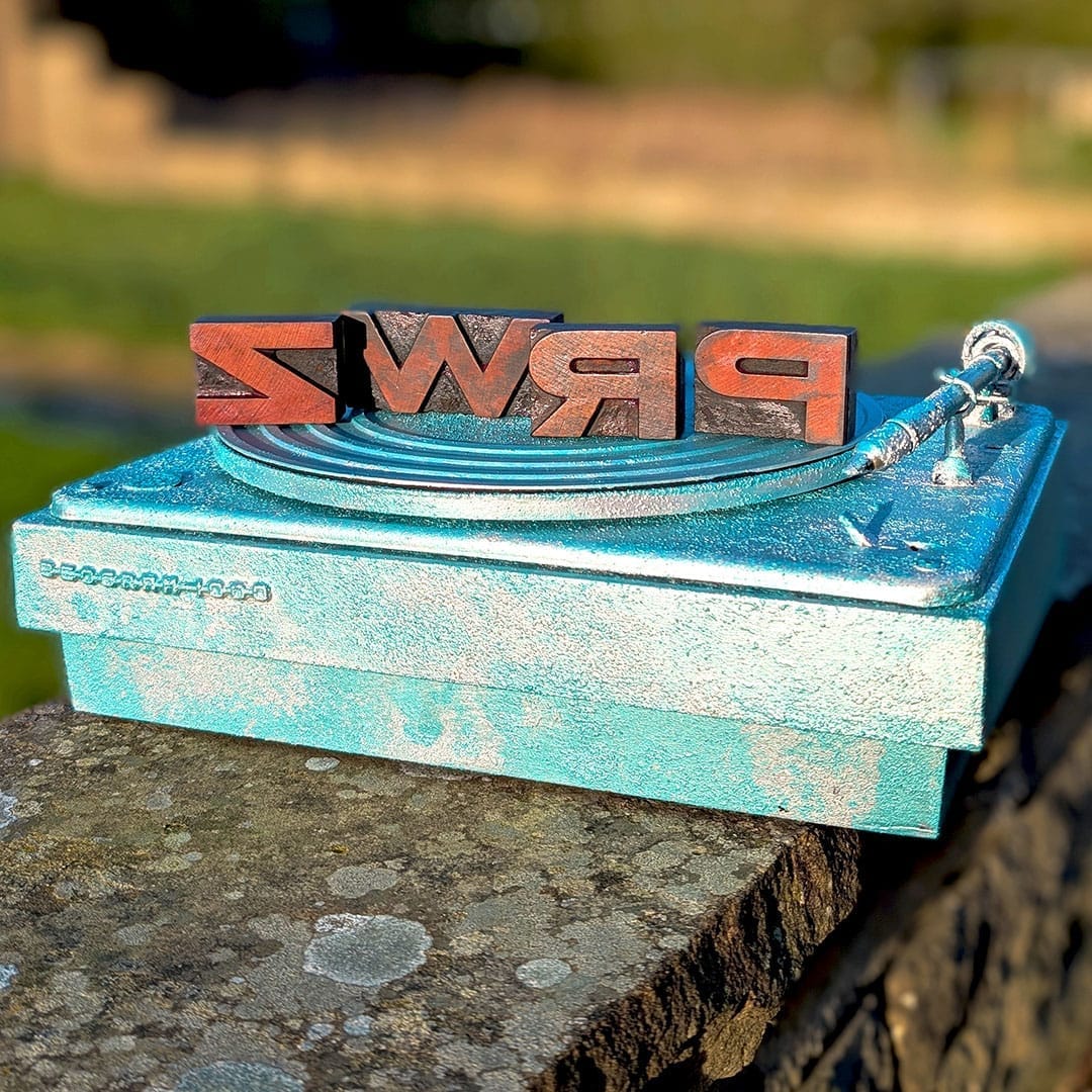 Glitched image digital artwork of a Robot Mannequin DJ