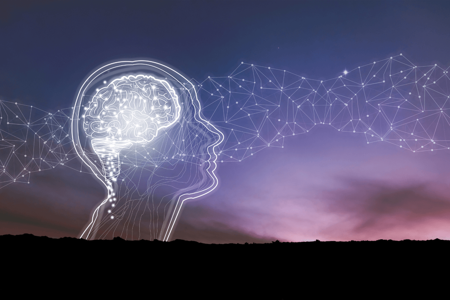 Silhouette d'un cerveau lumineux sous un ciel étoilé